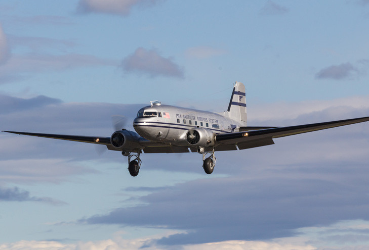 Historic Flight Foundation CNAC #100 aloft in Pan Am Colors, Photo by Liz Matzelle