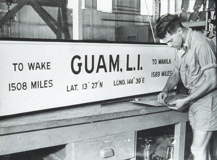 Guam sign being built Stan Cohen photo Pelican Film Collection