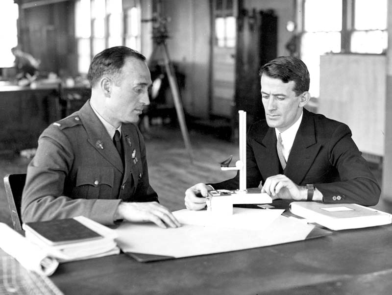 Harold Gatty instructing Air Corps Officer Yeager on his invention - the drift meter - February 1932